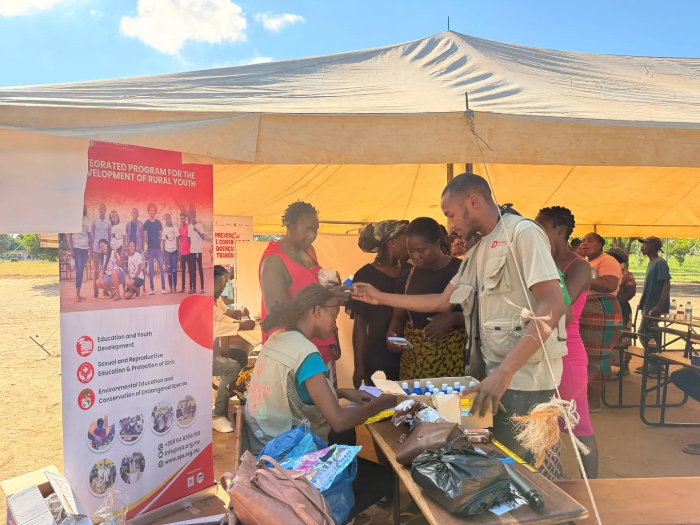 AJA team at a PRRE health fair tent